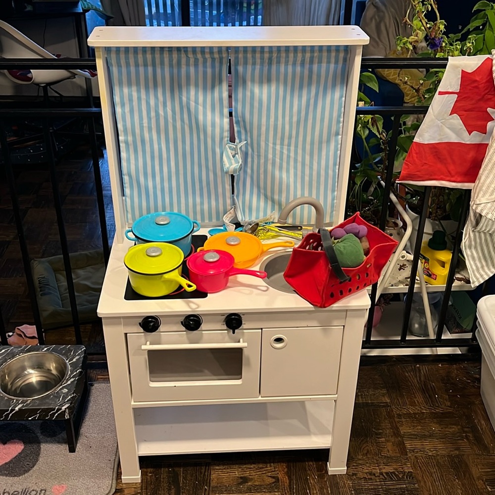 Complete kids kitchen, pots, utensils, and food set.